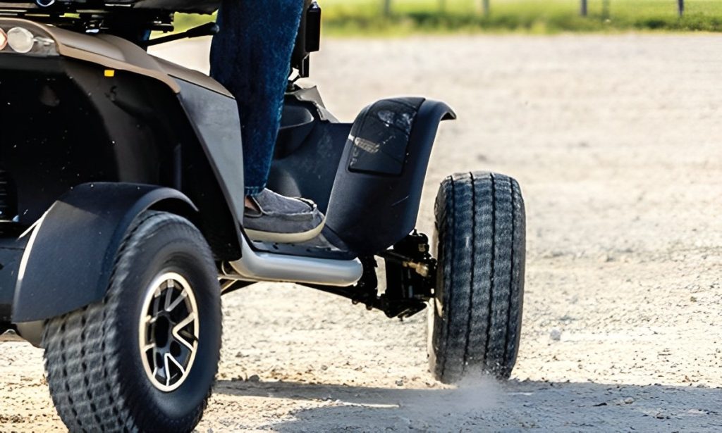 Mobility scooter wheels at top speed on trail