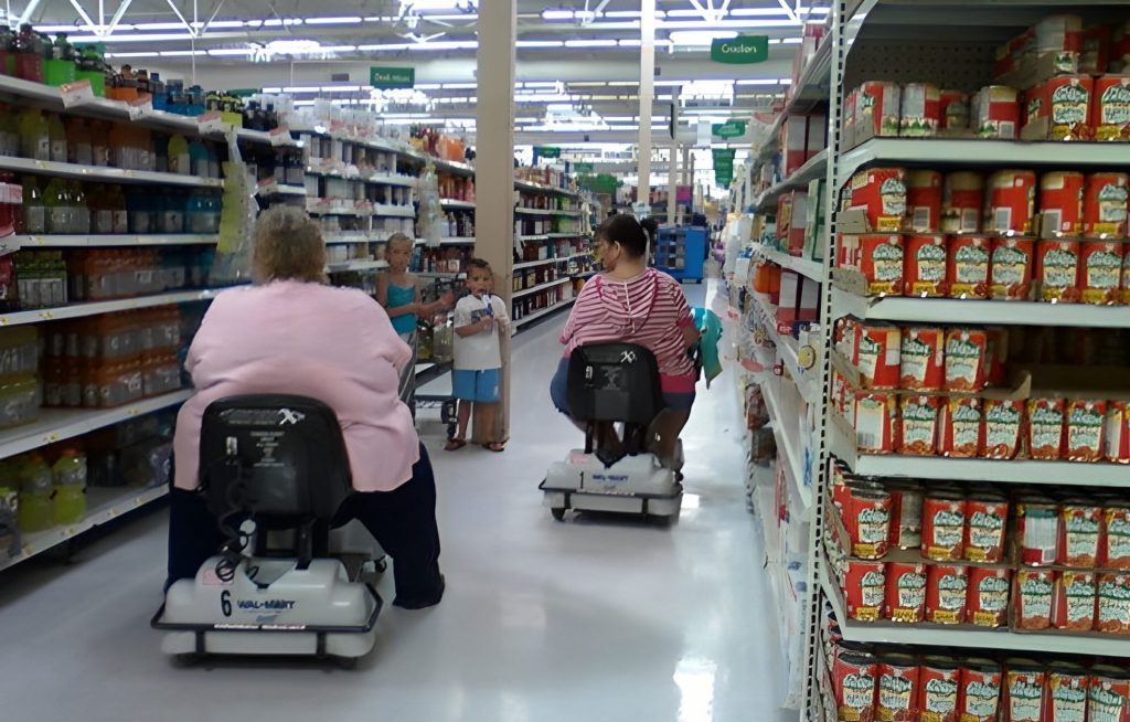 Electric shopping carts lined up in a supermarket