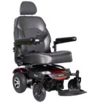 Front side view of the Merits Regal wheelchair, displaying its streamlined design, comfortable seat, and sturdy wheel...