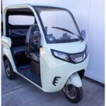 Pushpak 7000 enclosed cabin three-passenger fast mobility scooter