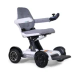 White Golden Technologies Ally Sport GP305 power chair with gray seat cushions and armrests shown in ready-to-use position.