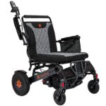 Bangeran Mammoth EX power wheelchair angled view showing quilted backrest and push handle