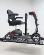 Side view of a 4 wheel scooter raised on the Lift n Go Model 210