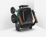 Robooter E40 folded upright showing backrest storage and joystick