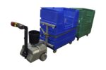 Pony Express tugger moving laundry bins in a facility
